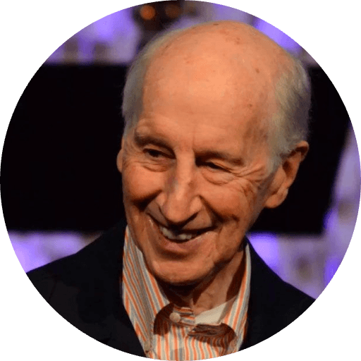 Pastor Jack Hayford smiling, mid-conversation